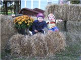 2 cuties on a haystack