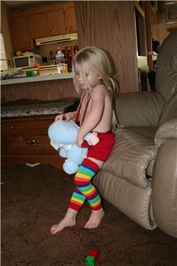 Kyla in the Baby Legs with her own homemade MT out of ribbon.  